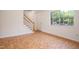 Spacious entryway has a parquet floor, staircase and bright window to the front yard at 1002 Willow Drive Dr # 37, Chapel Hill, NC 27514