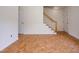 Spacious living room with staircase and hardwood floors at 1002 Willow Drive Dr # 37, Chapel Hill, NC 27514