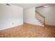 Spacious living room with staircase and hardwood floors at 1002 Willow Drive Dr # 37, Chapel Hill, NC 27514