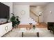 Bright living room boasts a parquet floor, modern furniture, and minimalist decor at 1002 Willow Drive Dr # 37, Chapel Hill, NC 27514