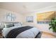 Stylized Main bedroom featuring large window, neutral walls and hardwood floors at 1002 Willow Drive Dr # 37, Chapel Hill, NC 27514