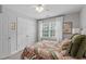 Comfortable bedroom with natural light, and double door closet at 1004 Manderston Ln, Apex, NC 27502