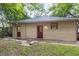Back view of building with two entrances and well manicured lawn and landscaping at 1008 Dorothea Dr, Raleigh, NC 27603