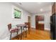 Cozy kitchen nook with breakfast table, chairs, and plenty of natural light at 1008 Dorothea Dr, Raleigh, NC 27603