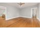 Spacious living room with hardwood floors, neutral paint, and ample natural light at 1008 Dorothea Dr, Raleigh, NC 27603