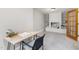 Bright living room with fireplace, carpet, built-in shelves, and natural light at 1008 Dorothea Dr, Raleigh, NC 27603