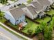 Aerial view of a well-maintained backyard featuring a patio, lawn, playground, and privacy fence at 102 Michelangelo Pl, Morrisville, NC 27560