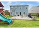 Backyard with a patio, a play set and plenty of room to run at 102 Michelangelo Pl, Morrisville, NC 27560