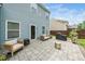 Backyard patio with a grill, furniture, and a view of the yard at 102 Michelangelo Pl, Morrisville, NC 27560