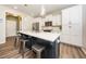 Stylish kitchen featuring a kitchen island with seating and modern appliances at 102 Michelangelo Pl, Morrisville, NC 27560