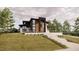 Stunning modern home with mixed materials and professional landscaping at 1021 Ferson, Apex, NC 27519