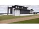 Modern two-story home with dark siding, white brick accents, and large windows at 1021 Ferson, Apex, NC 27519