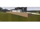Beautiful contemporary home with manicured lawn and professional landscaping at 1021 Ferson, Apex, NC 27519
