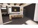 Modern kitchen with a large island, black accents, pendant lighting and dark grey flooring at 1021 Ferson, Apex, NC 27519