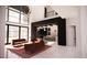 Spacious living room with floor-to-ceiling windows and stylish decor at 1021 Ferson, Apex, NC 27519