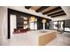 Bright living area with black trim windows, fireplace, open floor plan, and dining area at 1021 Ferson, Apex, NC 27519