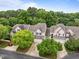Aerial view of a residential community with tree-lined streets and well-maintained homes at 103 Lake Tillery Dr, Cary, NC 27519