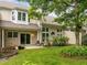 Picturesque backyard oasis with a green lawn, a patio, and lush greenery at 103 Lake Tillery Dr, Cary, NC 27519