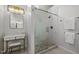 Stylish bathroom featuring a glass-enclosed shower, vanity area, and modern fixtures at 103 Lake Tillery Dr, Cary, NC 27519