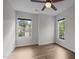 A bright, airy bedroom with hardwood floors and dual windows at 103 Lake Tillery Dr, Cary, NC 27519