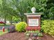 Lakeridge Preston Village community sign surrounded by lush landscaping with flowers and greenery at 103 Lake Tillery Dr, Cary, NC 27519