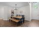 Inviting dining area with a modern light fixture and stylish decor at 103 Lake Tillery Dr, Cary, NC 27519