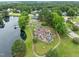 Aerial view of community playground with lush greenery and walking path at 103 Lake Tillery Dr, Cary, NC 27519