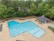 Aerial view of Preston Village community pool with lounge chairs and a gazebo at 103 Lake Tillery Dr, Cary, NC 27519