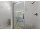 Close-up view of a glass enclosed shower with modern fixtures at 103 Lake Tillery Dr, Cary, NC 27519