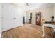 Bonus room with wood-look tile, a large closet, and a wooden bookshelf at 103 Lochwood West Dr, Cary, NC 27518