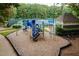 Well-maintained playground featuring climbing structures, slides, and plenty of space for active fun at 103 Lochwood West Dr, Cary, NC 27518