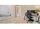 Bedroom featuring a desk with two monitors, carpet floors, and closet with sliding doors at 103 Rose Sky Ct, Cary, NC 27513