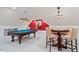 Finished basement with pool table, bar table and decorative lighting at 103 Rose Sky Ct, Cary, NC 27513