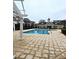 Community pool with an adjacent clubhouse. Beautiful pool deck with pergolas, great for relaxing and enjoying the outdoors at 10529 Sablewood Dr # 111, Raleigh, NC 27617
