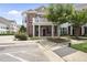 Beautiful brick condo with a charming balcony, trimmed shrubbery and a well-maintained lawn at 10529 Sablewood Dr # 111, Raleigh, NC 27617