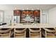 Modern kitchen with stainless steel appliances, granite countertops, and a large island at 10529 Sablewood Dr # 111, Raleigh, NC 27617