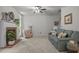 Relaxing living room features a fireplace, comfortable seating, and ample natural light for a cozy ambiance at 106 Fawley Ct, Cary, NC 27519