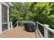 Outdoor deck perfect for summer BBQs, with tree-lined backyard at 106 Painted Turtle Ln, Cary, NC 27519