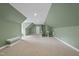 Spacious bonus room with carpeted floors, neutral paint, recessed lighting, and lots of natural light at 106 Painted Turtle Ln, Cary, NC 27519