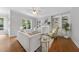 Cozy living room with built-in bookshelves, a fireplace, and comfortable seating arrangements at 106 Painted Turtle Ln, Cary, NC 27519