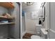 Bathroom featuring a walk-in shower, wood-look flooring, and vanity at 1105 Hawthorne Ln, Burlington, NC 27215