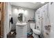 Cozy bathroom featuring updated fixtures, a modern vanity, and ample storage at 1105 Hawthorne Ln, Burlington, NC 27215
