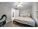 Serene bedroom with soft carpeting and natural light creates a relaxing space at 1105 Hawthorne Ln, Burlington, NC 27215