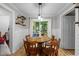 Dining Room with wood floors, and outdoor views at 1105 Hawthorne Ln, Burlington, NC 27215