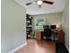 Bright office space features hardwood floors, a window, and shelving unit at 1109 Buckingham Rd, Garner, NC 27529