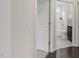 A view of a bright bathroom from an open door showing a toilet, shower and vanity at 118 Manning Way, Durham, NC 27703