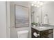 Bathroom featuring a sink, toilet, and an artistic painting on the wall at 118 Manning Way, Durham, NC 27703