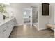 Bright bathroom featuring tile flooring, a granite countertop vanity, a shower, and a bedroom view at 118 Manning Way, Durham, NC 27703