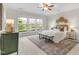 Relaxing bedroom with three windows, neutral tones, and a decorative rug at 118 Manning Way, Durham, NC 27703