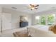Bright bedroom filled with natural light, a dresser, and a neutral color palette at 118 Manning Way, Durham, NC 27703